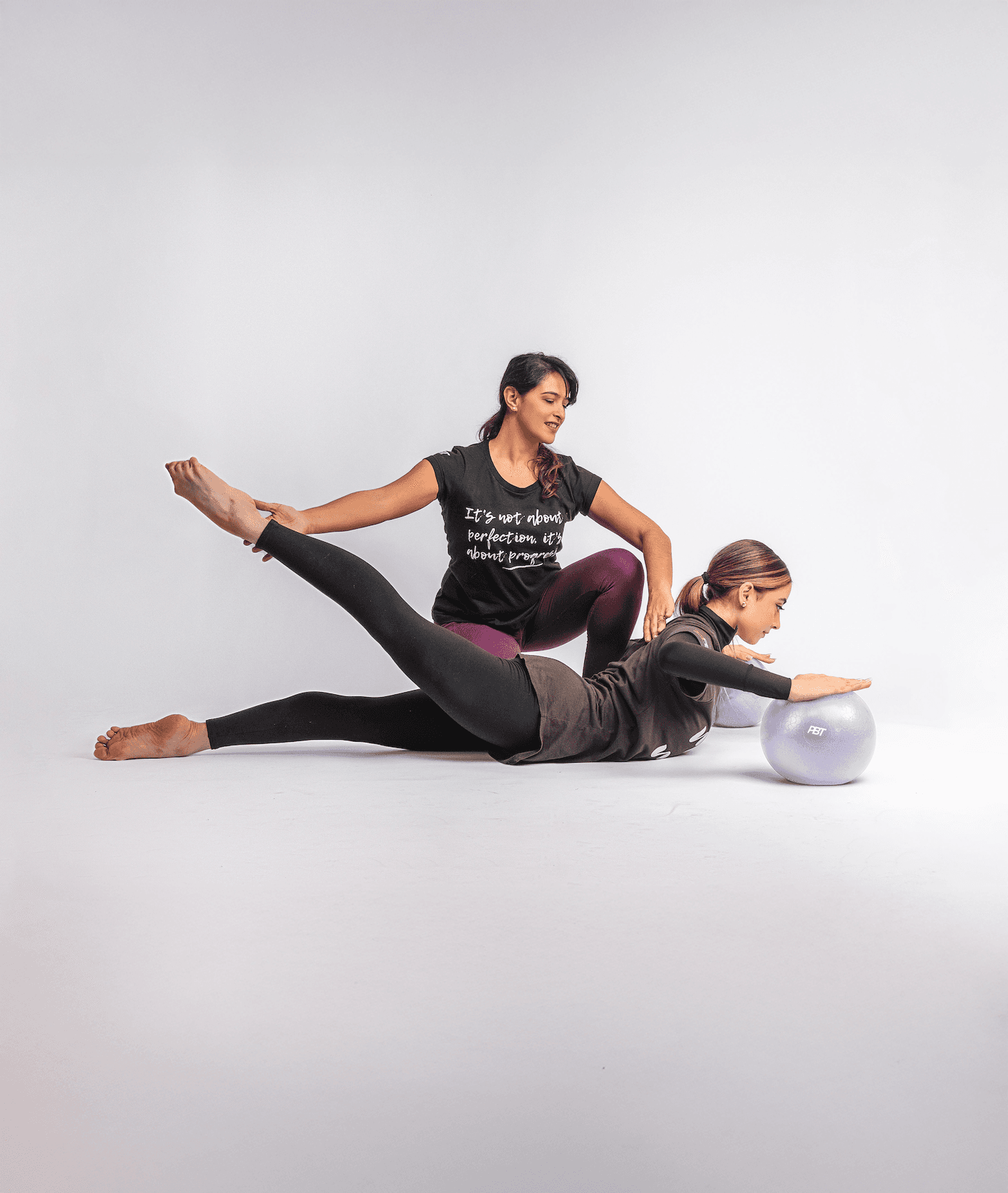 PBT teacher guiding a student through a conditioning exercise